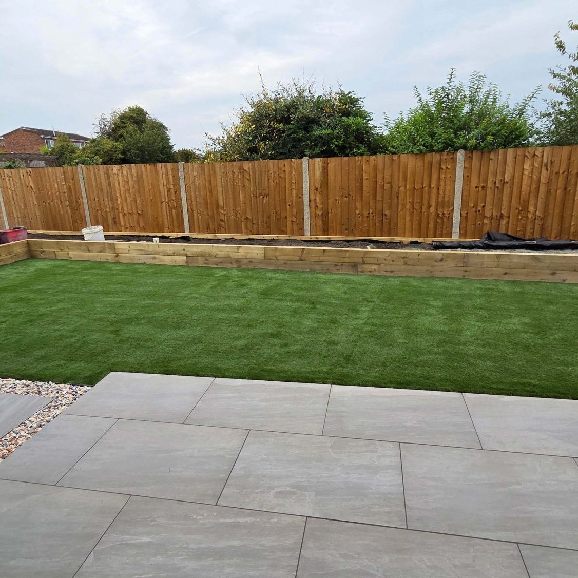 porcelain paving with grass area